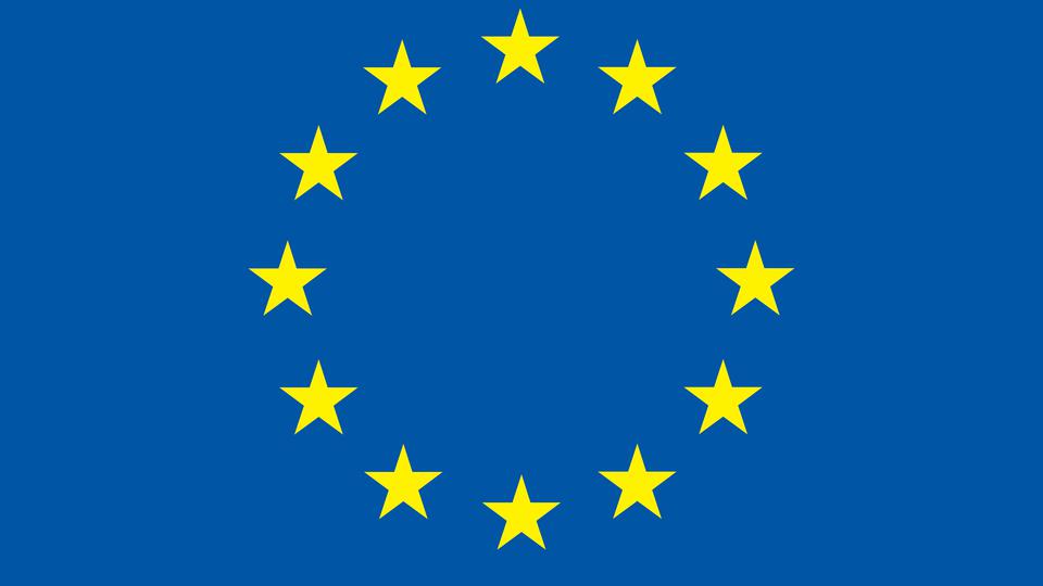 The EU flag, 12 yellow stars on a blue background.